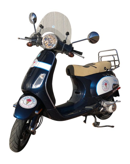Navy Vespa scooter with Gelato Brothers Dessert Bar decals and a cream leather seat